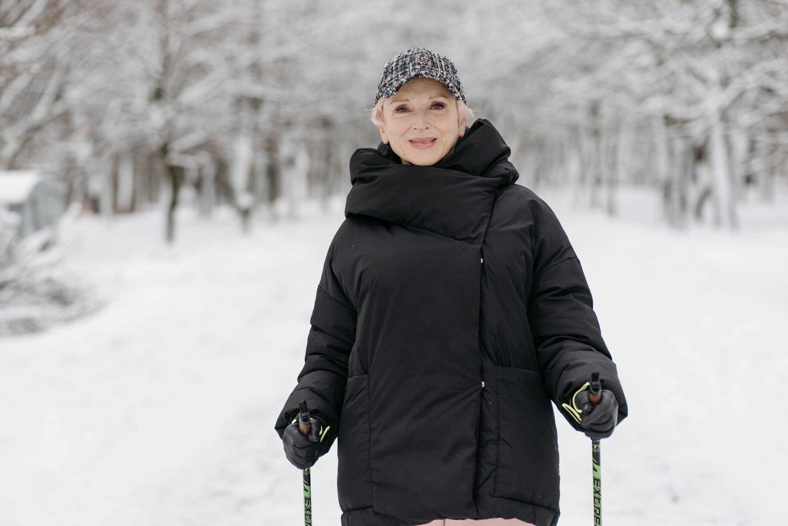 Active woman walking outdoors, reflecting physical activity as one of the strongest evidence-backed longevity factors