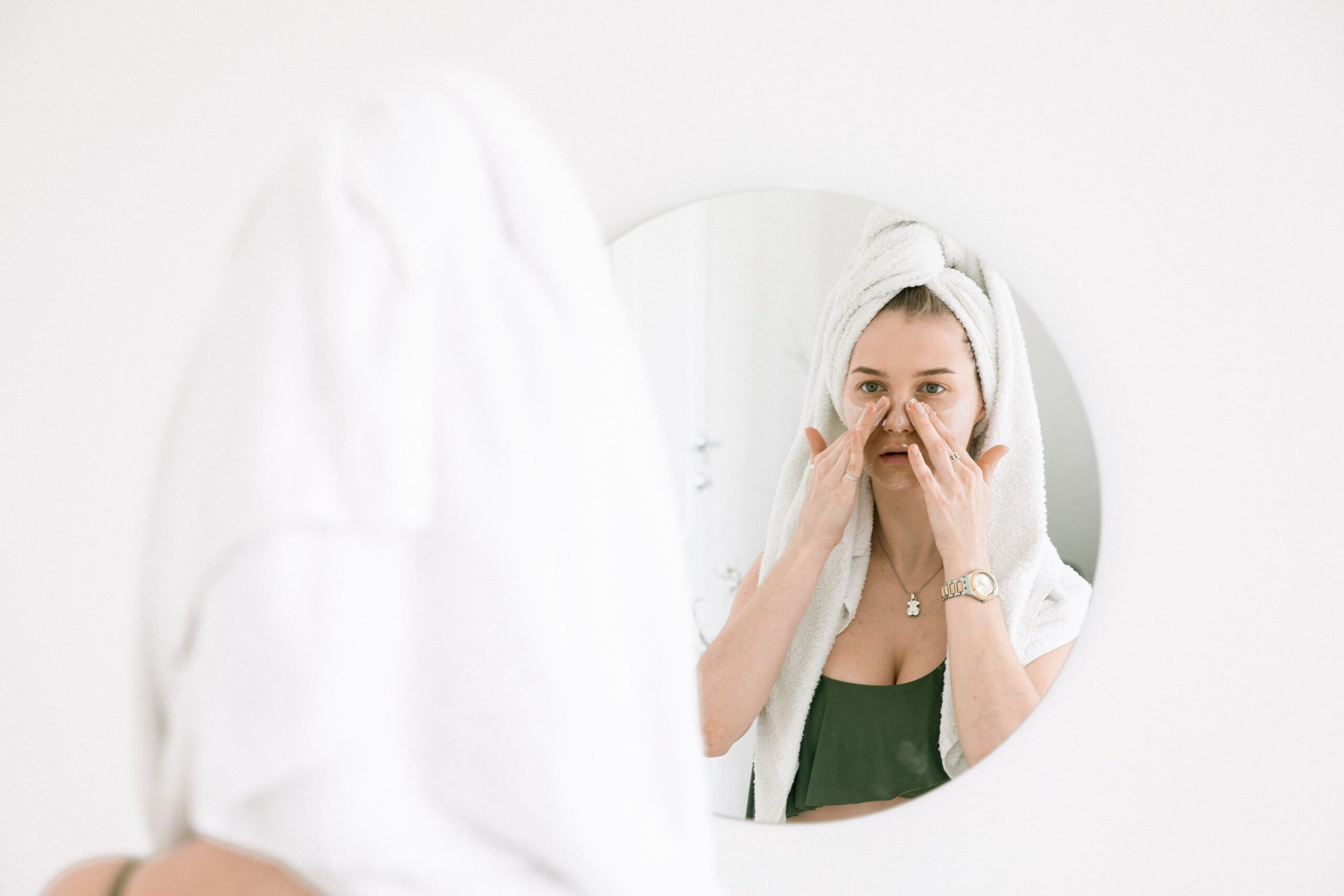 Sunscreen lotion being applied, the most evidence-backed step for preventing visible skin aging