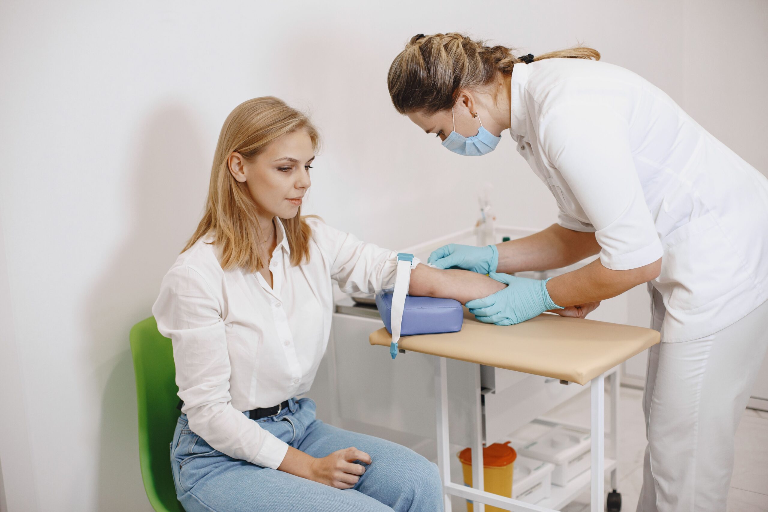 Woman having blood drawn for a thyroid function test